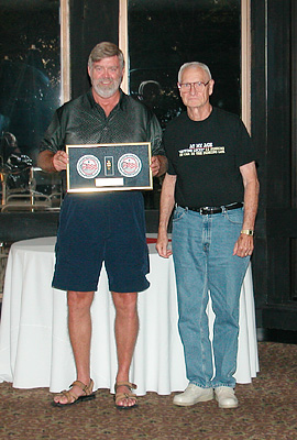 Glenn Purdy (right) presenting the 2003 Glenn Purdy Meritorious Service Award to Terry Miller